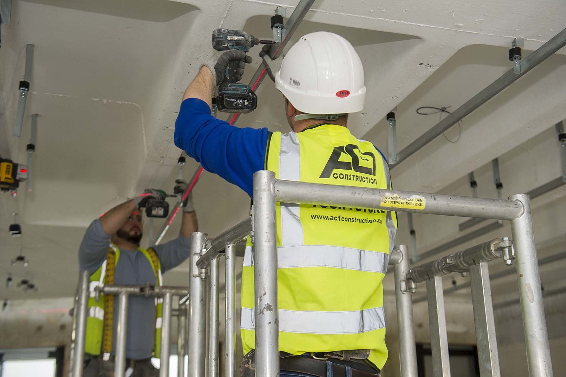 AC1 operative fixing ceiling framework from a mobile tower